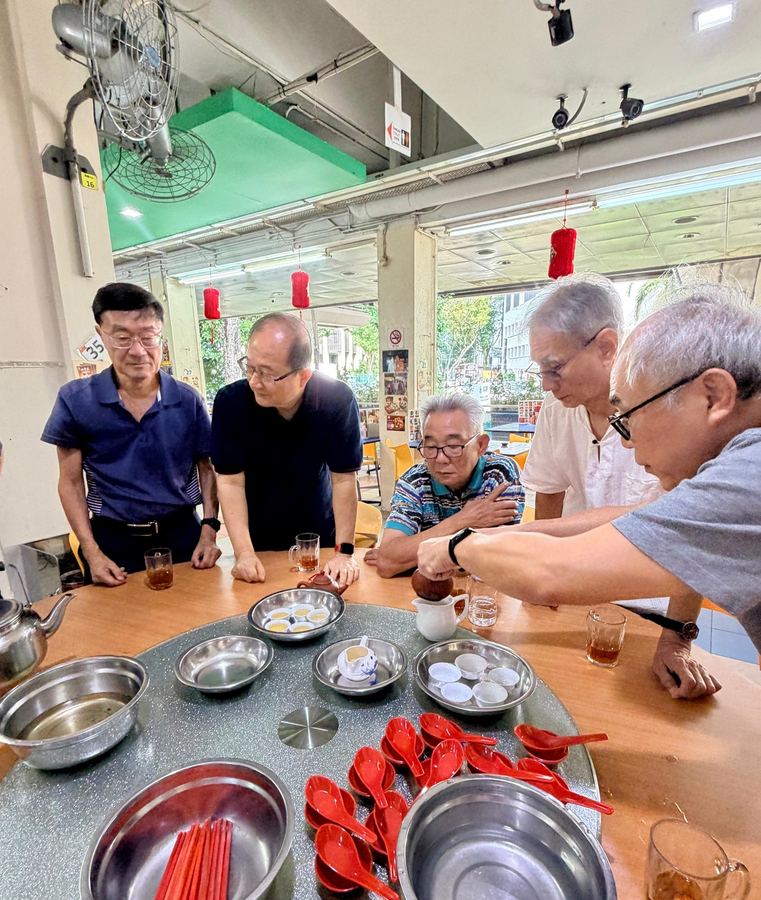 Seniors gathered around the BKT table at Outram Ya Hua