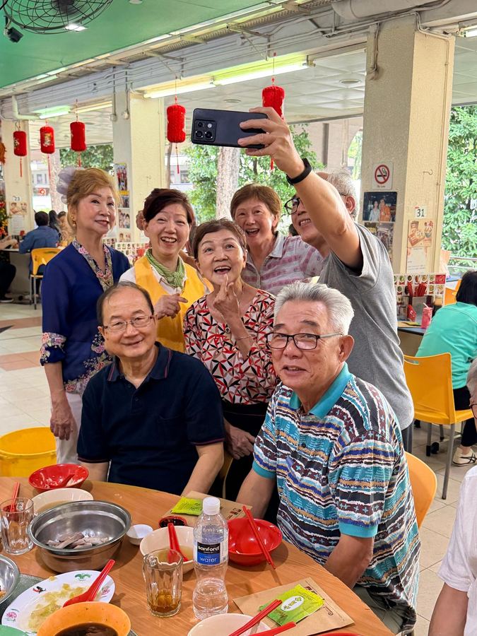 Seniors taking a fun selfie at the BKT food heritage tour