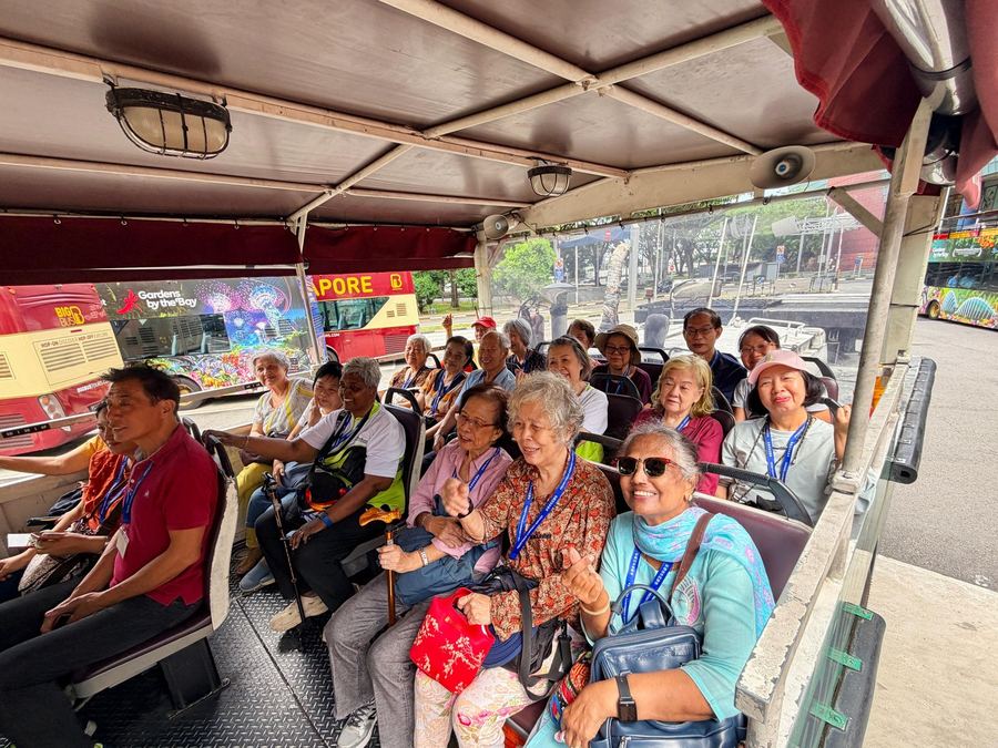 Seniors enjoying the scenic Singapore Duck Tour route
