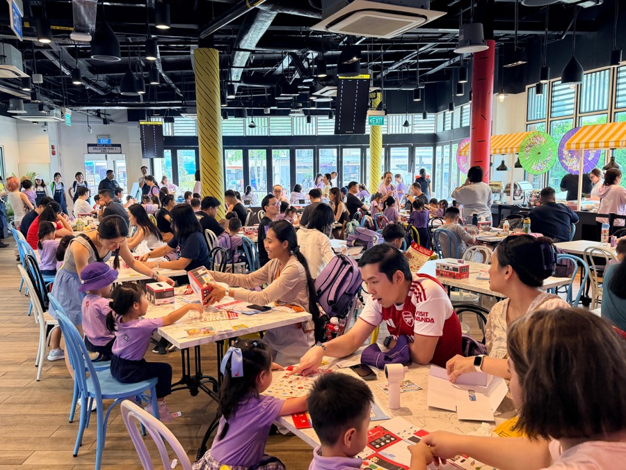 A childcare family day group dining and doing craft activities inside Good Old Days Singapore Flavours